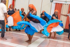 Women swinging while dancing ‘Karousel’